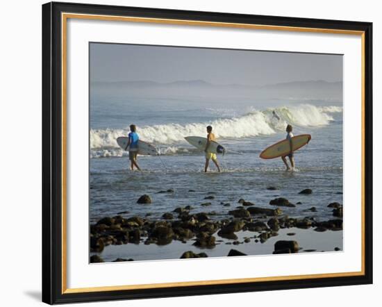 Surfers Head into the Surf at Mancora on the Northern Coast of Peru-Andrew Watson-Framed Photographic Print