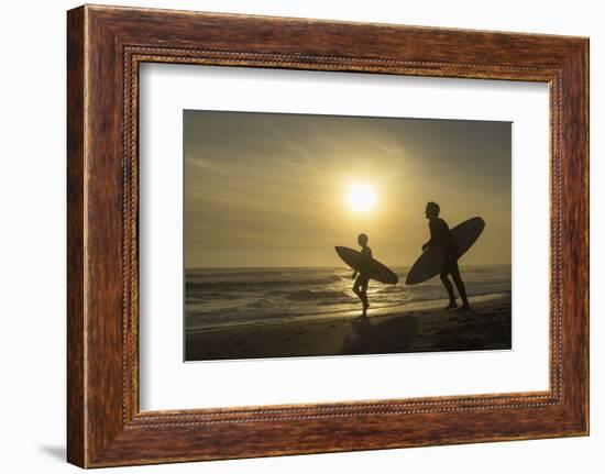 Surfers on Bloubergstrand at sunset, Cape Town, Western Cape, South Africa, Africa-Ian Trower-Framed Photographic Print