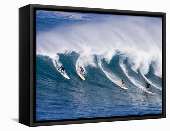 Surfers Ride a Wave at Waimea Beach on the North Shore of Oahu, Hawaii-null-Framed Premier Image Canvas