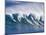 Surfers Ride a Wave at Waimea Beach on the North Shore of Oahu, Hawaii-null-Mounted Photographic Print