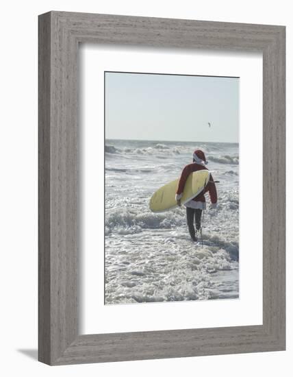 Surfing Santas, surfboards, Cocoa Beach, Florida, USA-Jim Engelbrecht-Framed Photographic Print