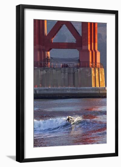 Surfing under the Golden Gate Bridge, San Francisco, California, USA-Chuck Haney-Framed Photographic Print