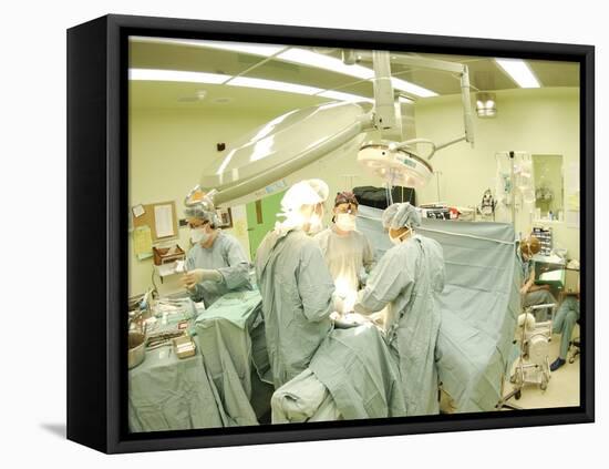 Surgeons Performing Operation-null-Framed Premier Image Canvas