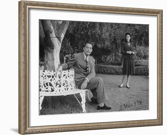 Surrealist Artist Salvador Dali with His Wife Gala in a Garden-Martha Holmes-Framed Premium Photographic Print