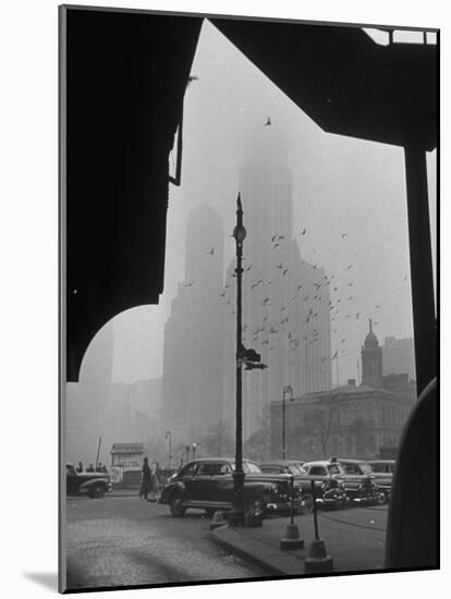 Surrounding the City in Fog, with City Hall and Woolworth Building in Background-Walter Sanders-Mounted Photographic Print