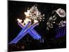 Surrounding the Olympic Flame as Fireworks Explode after the Opening Ceremony of 2010 Winter Games-null-Mounted Photographic Print