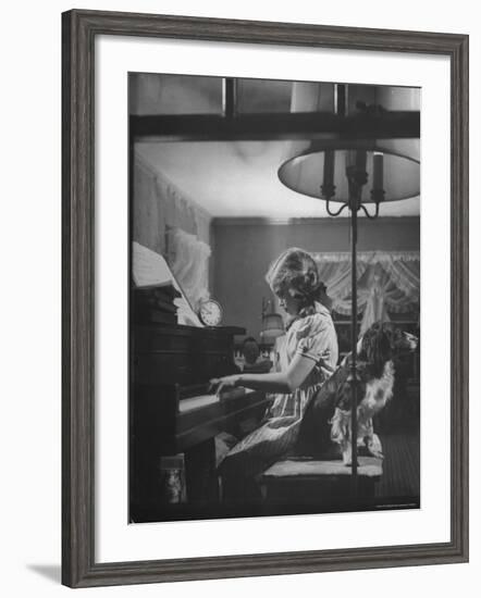 Suzy Creech, Typical Girl Known as a "Pigtailer" at Home Playing the Piano-Frank Scherschel-Framed Photographic Print