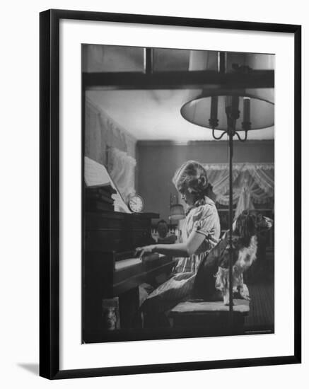 Suzy Creech, Typical Girl Known as a "Pigtailer" at Home Playing the Piano-Frank Scherschel-Framed Photographic Print