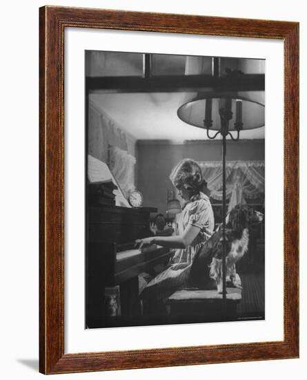 Suzy Creech, Typical Girl Known as a "Pigtailer" at Home Playing the Piano-Frank Scherschel-Framed Photographic Print