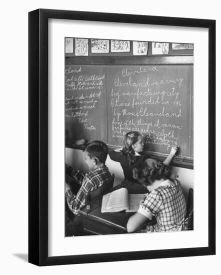 Suzy Creech, Typical Girl Known as a "Pigtailer" in Classroom, 5th Grade, Writing on the Board-Frank Scherschel-Framed Photographic Print