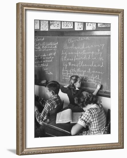 Suzy Creech, Typical Girl Known as a "Pigtailer" in Classroom, 5th Grade, Writing on the Board-Frank Scherschel-Framed Photographic Print