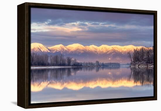Swan Mountains Reflect into the Flathead River, Sunset, Montana, USA-Chuck Haney-Framed Premier Image Canvas
