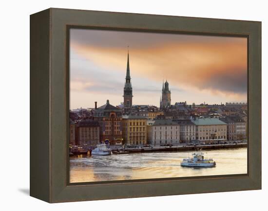 Sweden, Stockholm, Riddarfjarden, Gamla Stan, Passenger Ferries in Bay at Dusk-Shaun Egan-Framed Premier Image Canvas