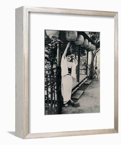 'Sweet natured smile of tea-house maid, called nesan - elder sister', c1900, (1921)-Julian Leonard Street-Framed Photographic Print