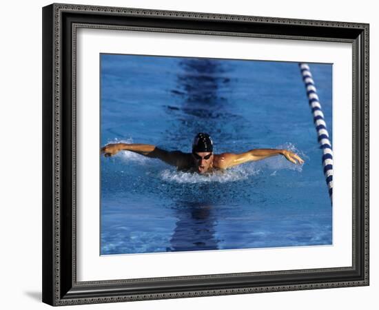 Swimmer Competing in a Butterfly Race-null-Framed Photographic Print