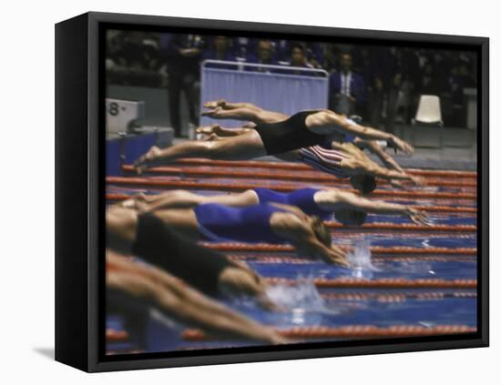 Swimmers Diving to Start a Race at Summer Olympics-null-Framed Premier Image Canvas