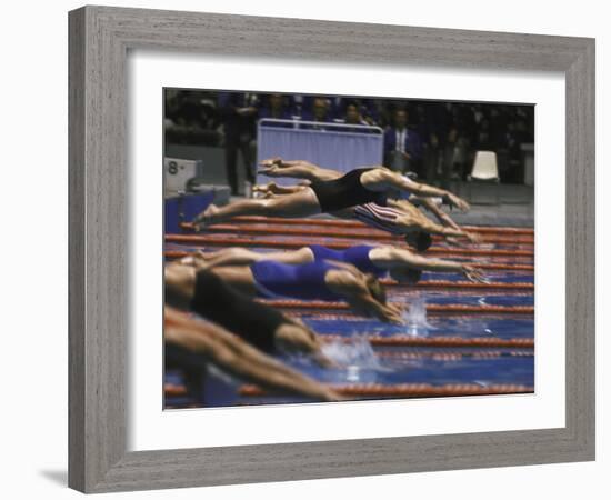 Swimmers Diving to Start a Race at Summer Olympics-null-Framed Photographic Print