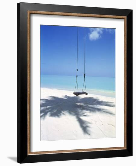 Swing on the Beach Above Palm Tree Shadow-null-Framed Photographic Print