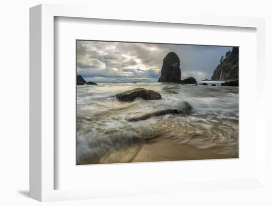 Swirling water around rocks on a beach-Sheila Haddad-Framed Photographic Print