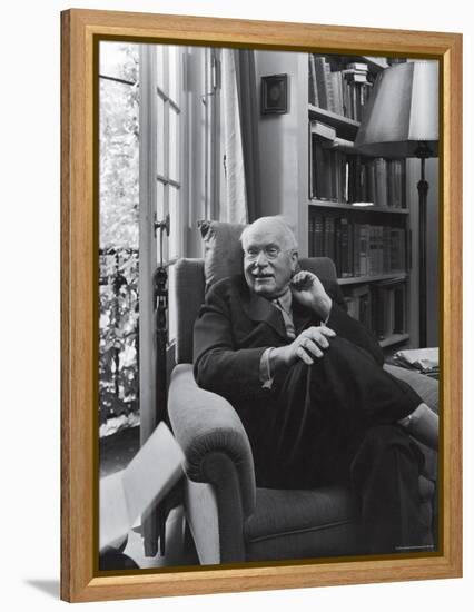 Swiss Psychiatrist Dr. Carl Jung Relaxing in an Easy Chair in His Library at Home-Dmitri Kessel-Framed Premier Image Canvas