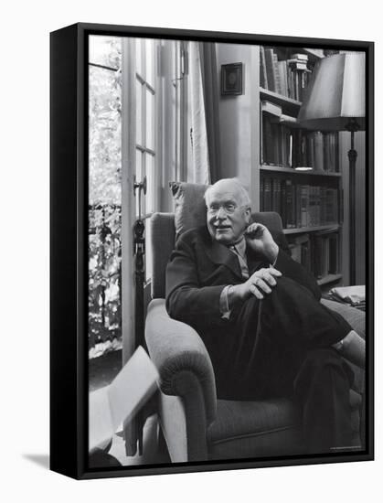 Swiss Psychiatrist Dr. Carl Jung Relaxing in an Easy Chair in His Library at Home-Dmitri Kessel-Framed Premier Image Canvas