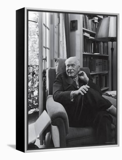 Swiss Psychiatrist Dr. Carl Jung Relaxing in an Easy Chair in His Library at Home-Dmitri Kessel-Framed Premier Image Canvas