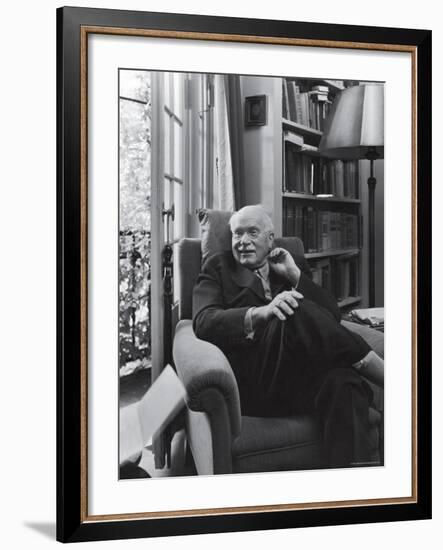 Swiss Psychiatrist Dr. Carl Jung Relaxing in an Easy Chair in His Library at Home-Dmitri Kessel-Framed Premium Photographic Print