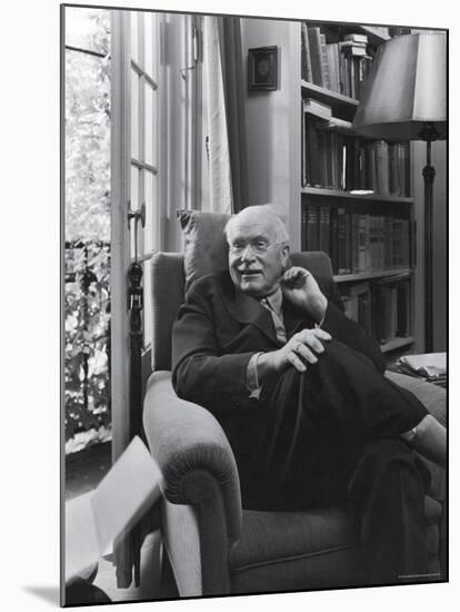Swiss Psychiatrist Dr. Carl Jung Relaxing in an Easy Chair in His Library at Home-Dmitri Kessel-Mounted Premium Photographic Print