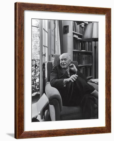 Swiss Psychiatrist Dr. Carl Jung Relaxing in an Easy Chair in His Library at Home-Dmitri Kessel-Framed Premium Photographic Print