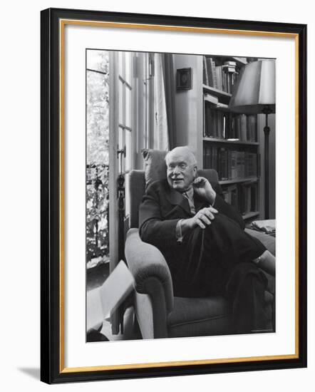 Swiss Psychiatrist Dr. Carl Jung Relaxing in an Easy Chair in His Library at Home-Dmitri Kessel-Framed Premium Photographic Print