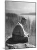 Swiss Psychiatrist Dr. Carl Jung Sitting on Stone Wall Overlooking Lake Zurich-Dmitri Kessel-Mounted Premium Photographic Print