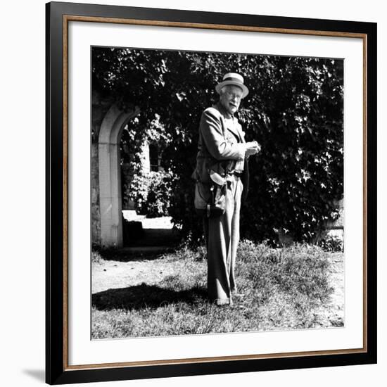 Swiss Psychiatrist Dr. Carl Jung Standing in Garden Outside His Home-Dmitri Kessel-Framed Premium Photographic Print