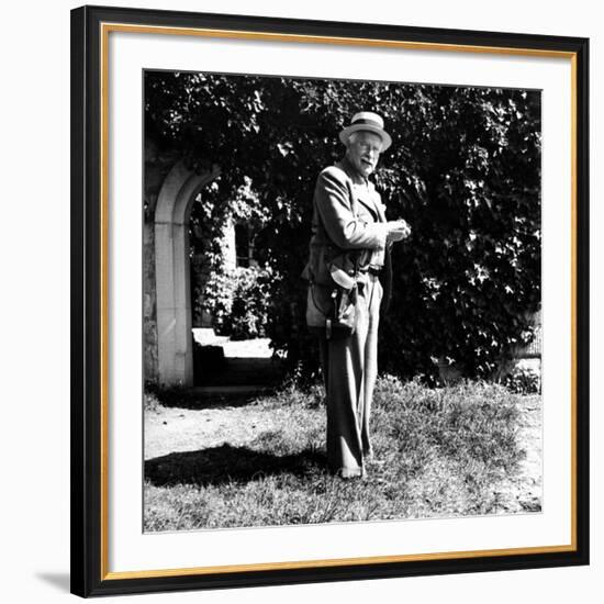 Swiss Psychiatrist Dr. Carl Jung Standing in Garden Outside His Home-Dmitri Kessel-Framed Premium Photographic Print