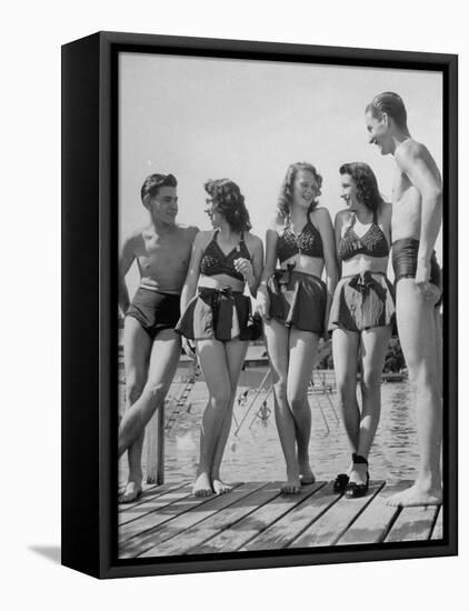 Swiss Youths Standing on the Boardwalk at the Beach-Yale Joel-Framed Premier Image Canvas