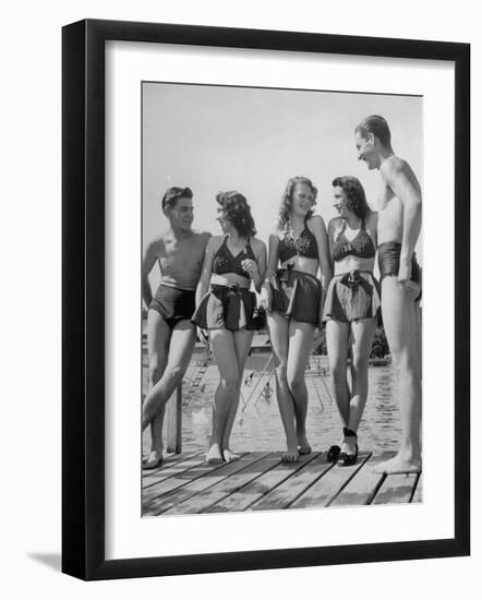 Swiss Youths Standing on the Boardwalk at the Beach-Yale Joel-Framed Photographic Print