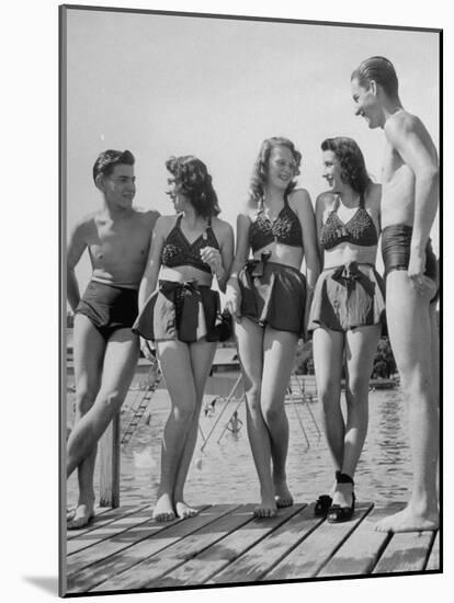 Swiss Youths Standing on the Boardwalk at the Beach-Yale Joel-Mounted Photographic Print