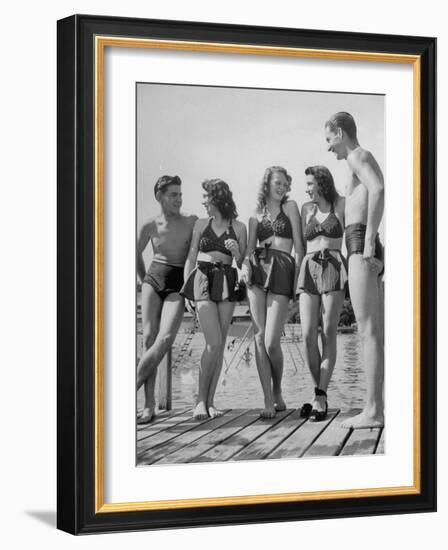 Swiss Youths Standing on the Boardwalk at the Beach-Yale Joel-Framed Photographic Print