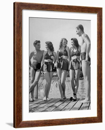 Swiss Youths Standing on the Boardwalk at the Beach-Yale Joel-Framed Photographic Print