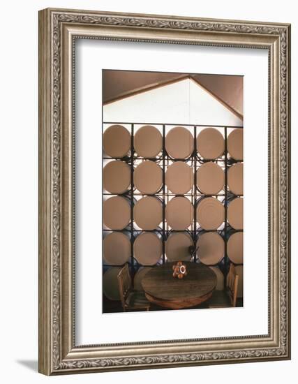 Table Againts a Stack of Barrels in a Geodesic Dome Home, Called 'Zome,' Corrales, NM, 1972-John Dominis-Framed Photographic Print