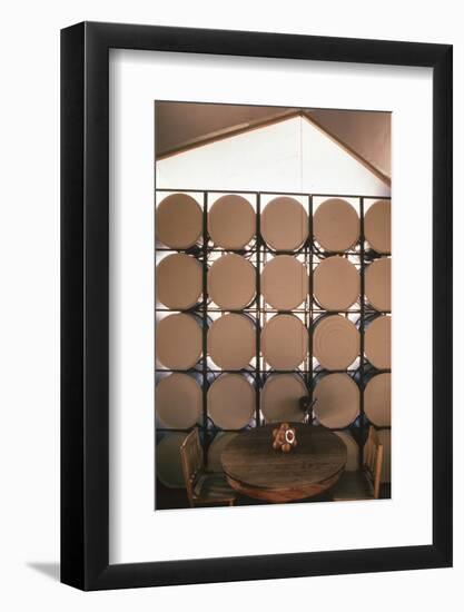 Table Againts a Stack of Barrels in a Geodesic Dome Home, Called 'Zome,' Corrales, NM, 1972-John Dominis-Framed Photographic Print