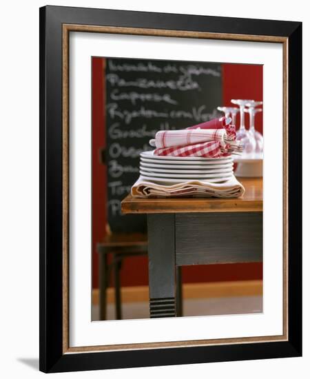 Table Linen: Fabric Napkins on a Pile of Plates-Jan-peter Westermann-Framed Photographic Print