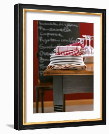 Table Linen: Fabric Napkins on a Pile of Plates-Jan-peter Westermann-Framed Photographic Print