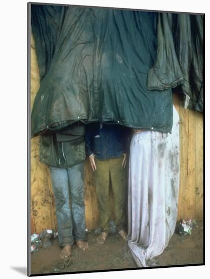 Taking Shelter from the Storm at Woodstock-Bill Eppridge-Mounted Photographic Print