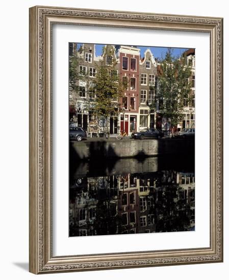 Tall Traditional Style Houses Reflected in the Water of a Canal, Amsterdam, the Netherlands-Richard Nebesky-Framed Photographic Print