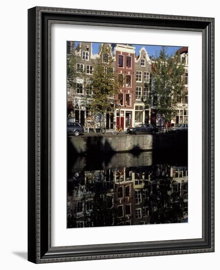 Tall Traditional Style Houses Reflected in the Water of a Canal, Amsterdam, the Netherlands-Richard Nebesky-Framed Photographic Print