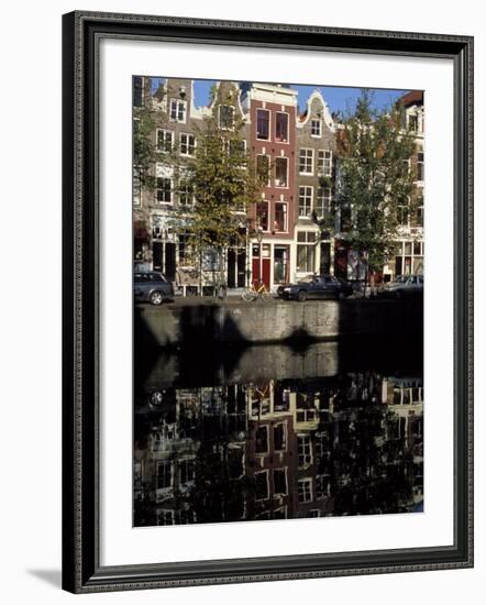 Tall Traditional Style Houses Reflected in the Water of a Canal, Amsterdam, the Netherlands-Richard Nebesky-Framed Photographic Print