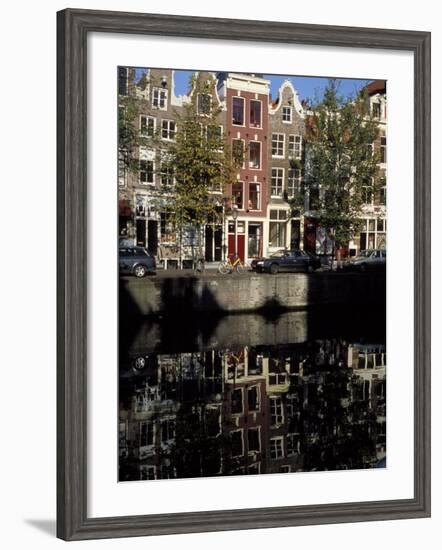 Tall Traditional Style Houses Reflected in the Water of a Canal, Amsterdam, the Netherlands-Richard Nebesky-Framed Photographic Print