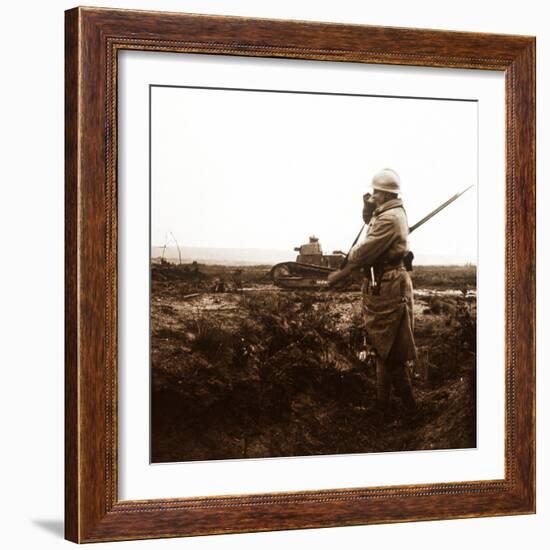 Tank and soldier on battlefield, c1914-c1918-Unknown-Framed Photographic Print