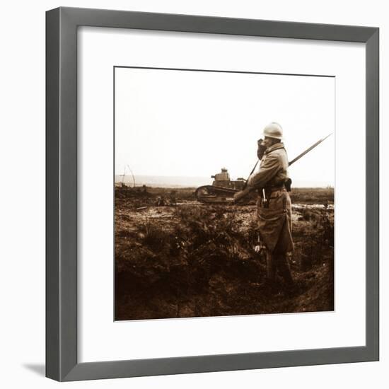 Tank and soldier on battlefield, c1914-c1918-Unknown-Framed Photographic Print