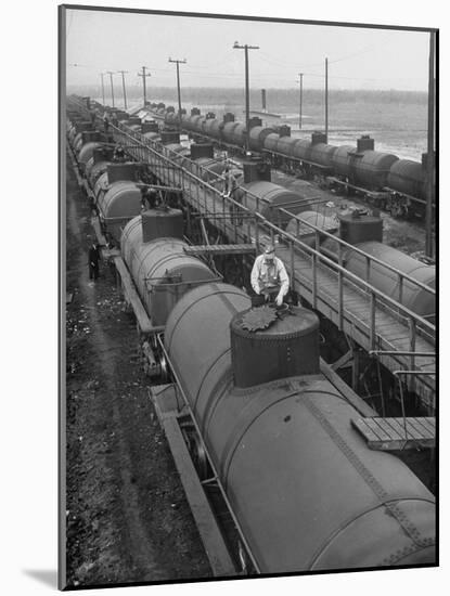 Tank Cars Line Up to Take on Crude Oil at Siding of Standard Oil of New Jersey Refinery-null-Mounted Photographic Print